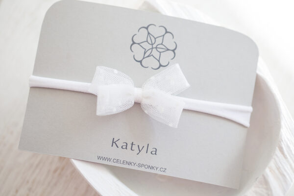 Dětská čelenka na&nbsp;gumičce s&nbsp;mašličkou bílá